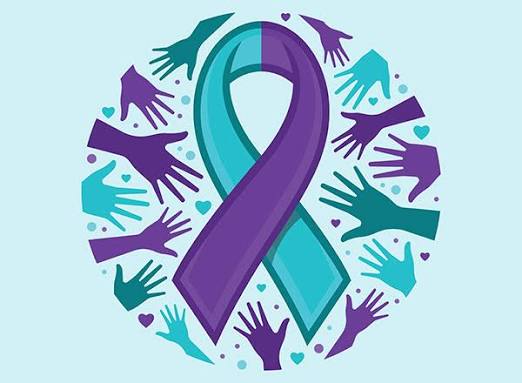 Suicide prevention ribbon in teal and purple surrounded by supportive hands
